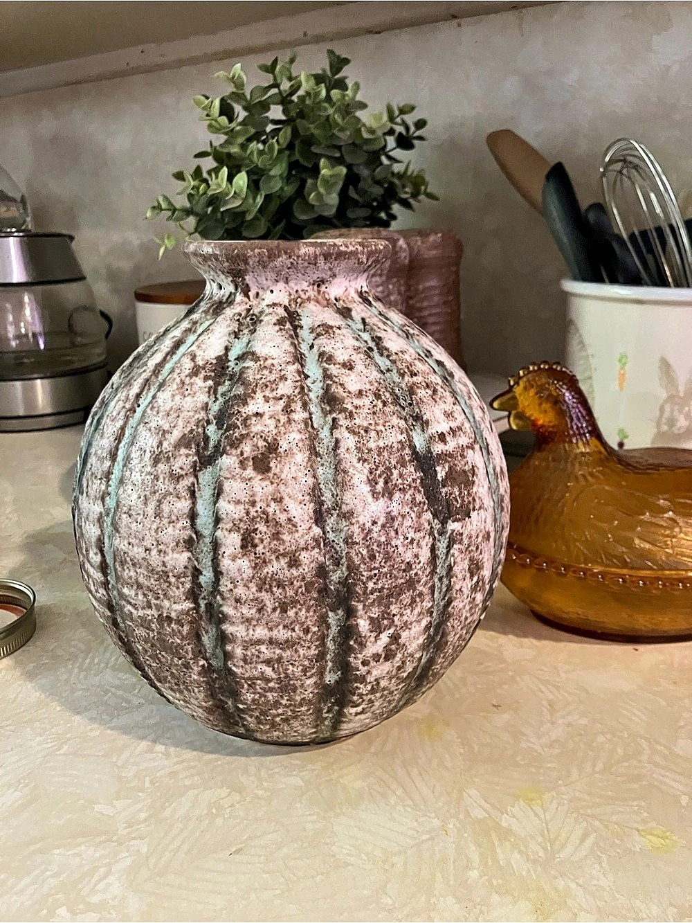 McCarty pottery nutmeg vase with cotton rows